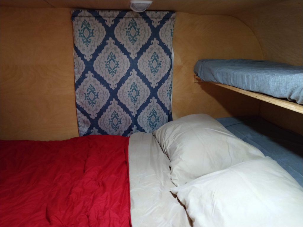 outfitting the trailer with bedding and curtains